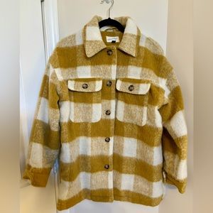 Warm, comfortable, mustard-yellow colored, checkered jacket. Size M.